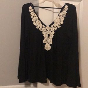 Black and white bell sleeve top